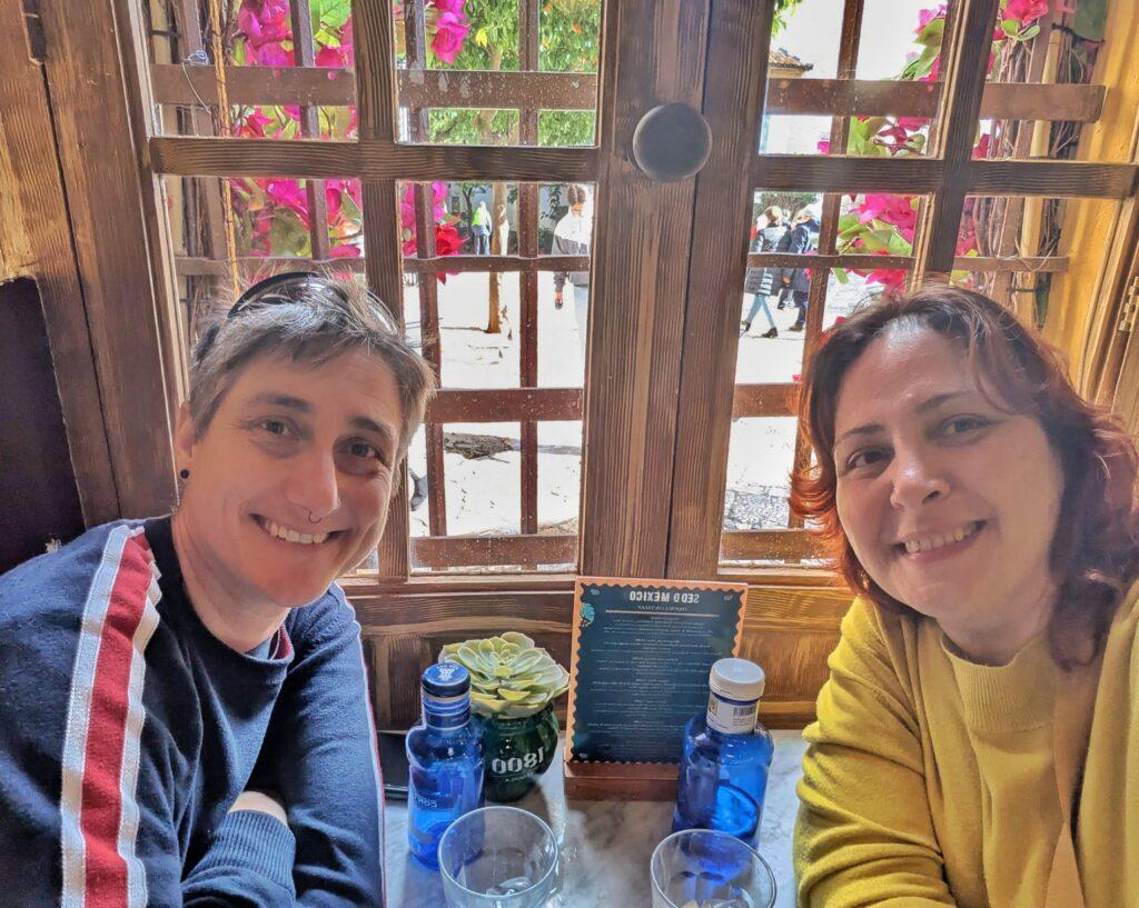 Cass and happy client in a restaurant