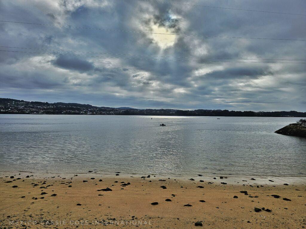 calm winter day at the beach, very cloudy