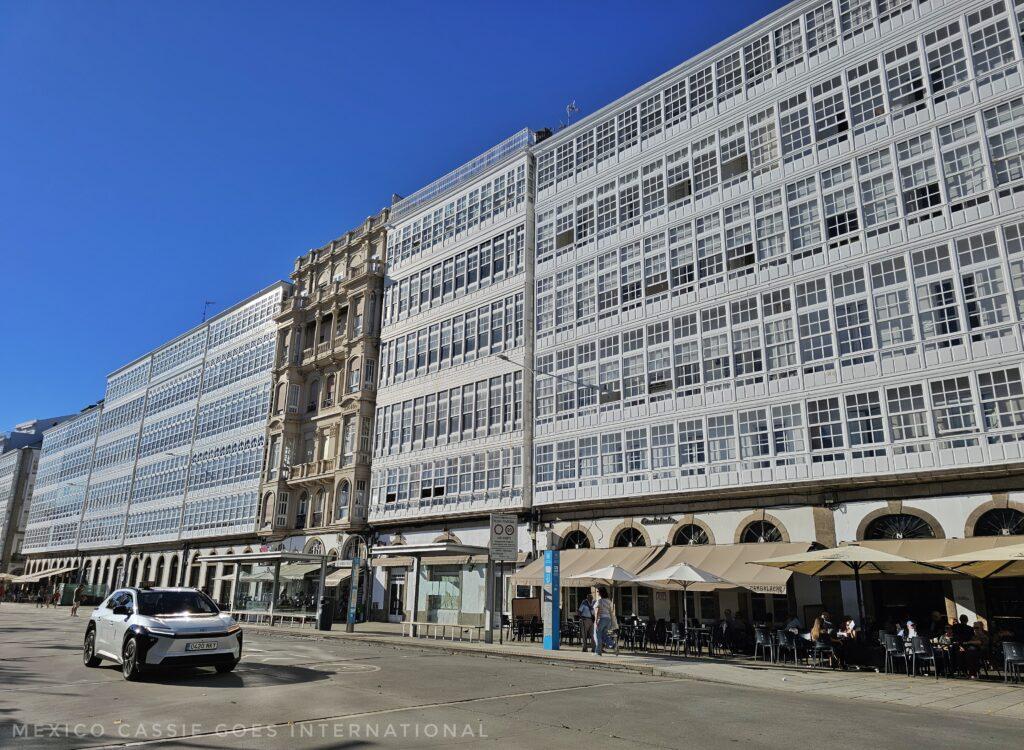 the glass fronted buildings in coruña