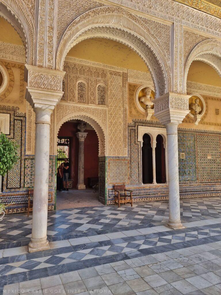 ornate arches, tiled floors