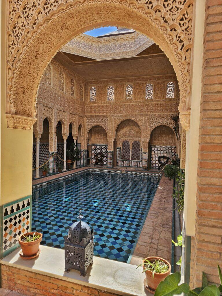 swimming pool in decorated area like alhambra