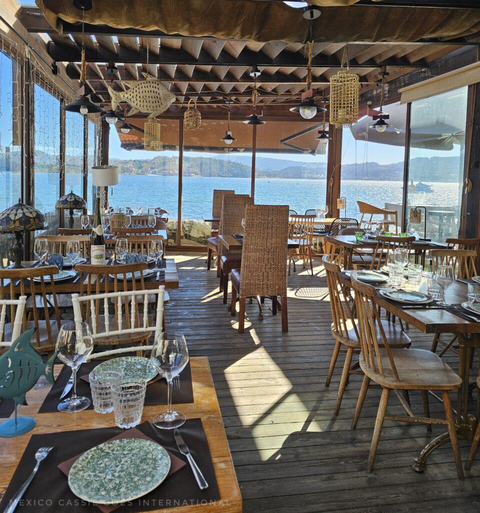 empty restaurant overlooking sea